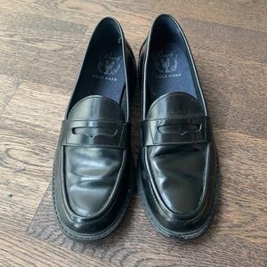 Cole Haan penny loafers.